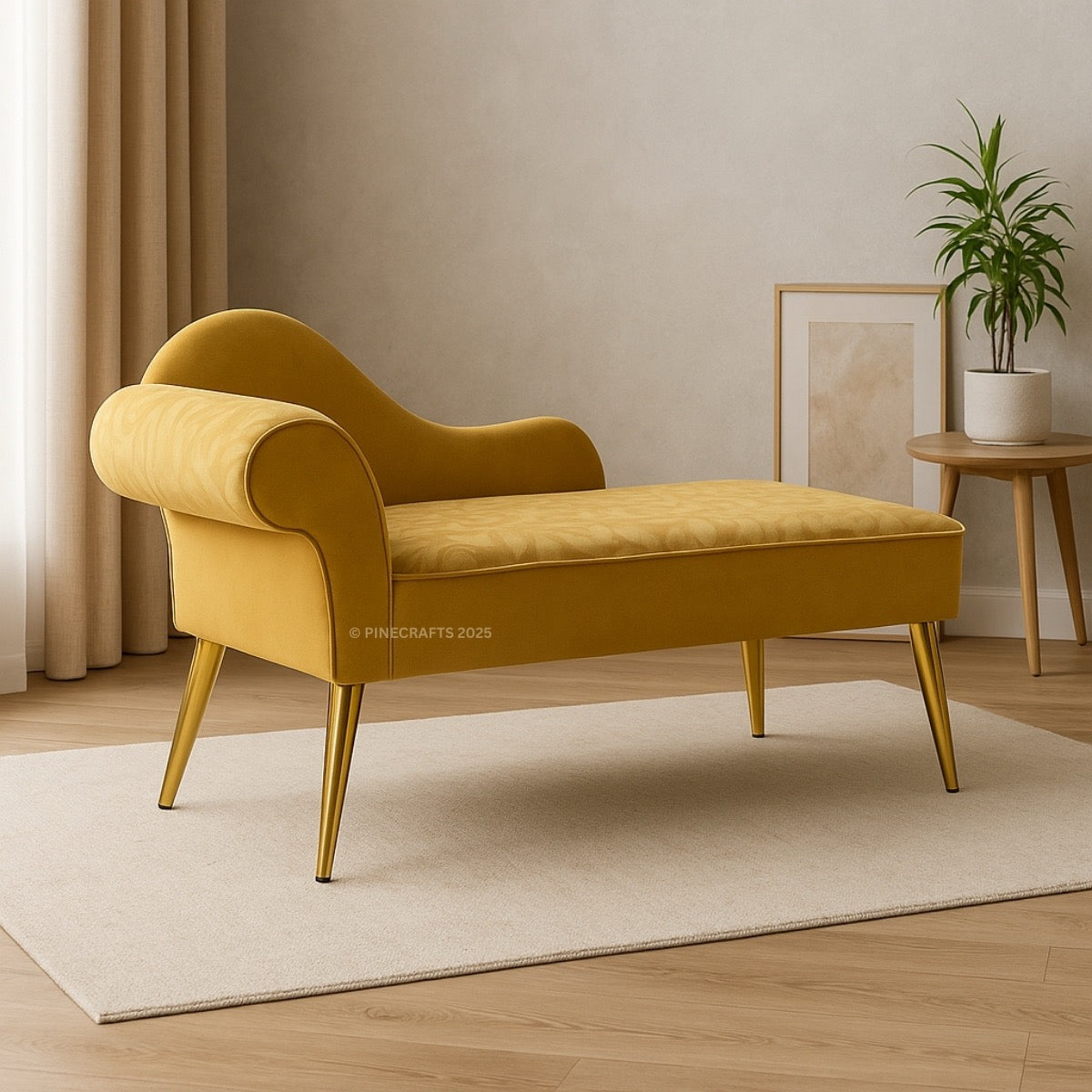 Mustard yellow chaise lounge in a room with a plant and side table.